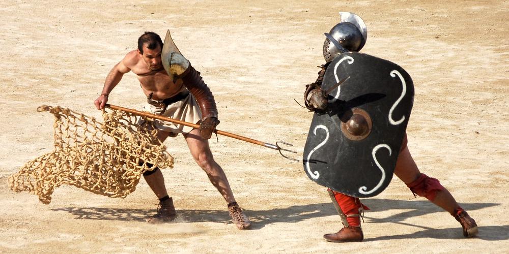 une journée de jeux romains dans l’amphithéâtre activité vacance de l'Office de Tourisme à Nîmes 